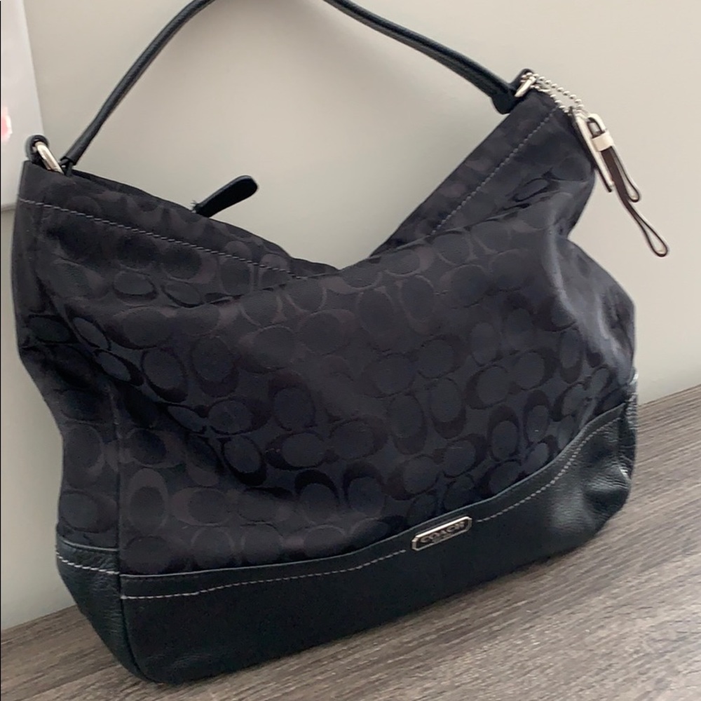 Black mixed media Coach handbag